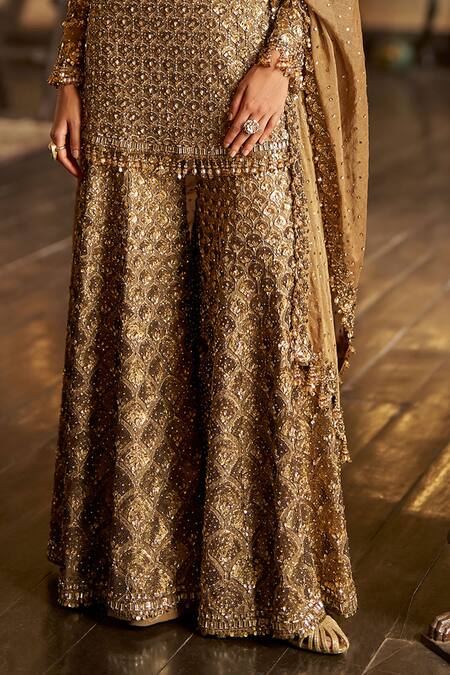 Shop Seema Gujral Gold Tissue, Georgette Sequins, Crystals, Beads, Tassels, Antique Sharara Set Online at Aza Fashions Shop_Seema Gujral_Gold Tissue, Georgette Sequins, Crystals, Beads, Tassels, Antique Sharara Set _Online_at_Aza_Fashions