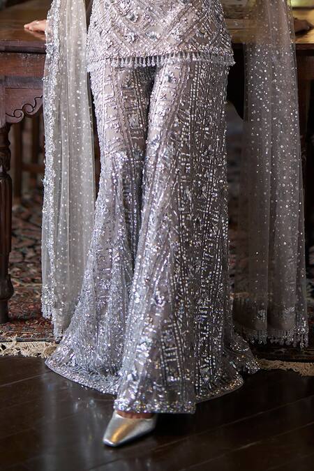 Seema Gujral_Silver Net Sequins, Crystals, Tassels Scoop Neck Embroidered Sharara Set _at_Aza_Fashions