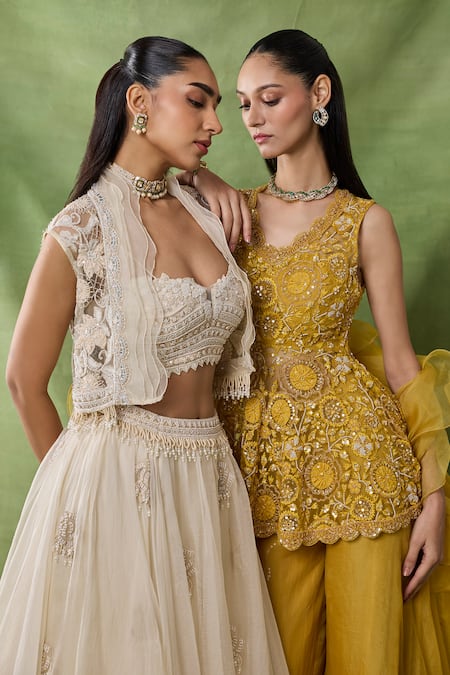 Awigna_Ivory Organza, Net Embroidery, Beads, Ruffles Lumieire Jacket Skirt Set _at_Aza_Fashions