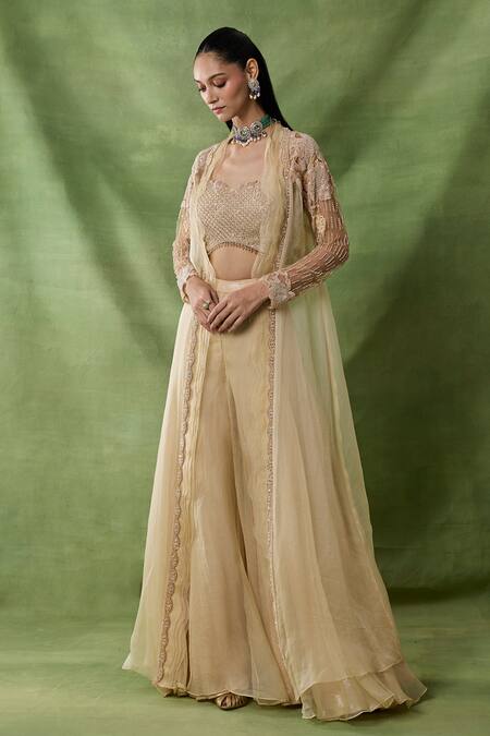 Buy Awigna Gold Organza, Net Embroidery, Beads, Sequins Open Sirona Laser Cape Sharara Set Online at Aza Fashions Buy_Awigna_Gold Organza, Net Embroidery, Beads, Sequins Open Sirona Laser Cape Sharara Set _Online_at_Aza_Fashions