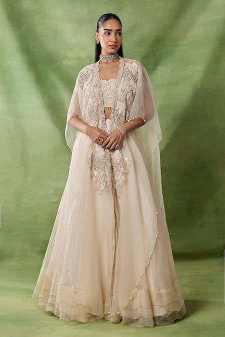 Buy_Awigna_Ivory Organza, Net Embroidery, Sequins, Beads, Freya Floral Cape Lehenga Set _Online_at_Aza_Fashions
