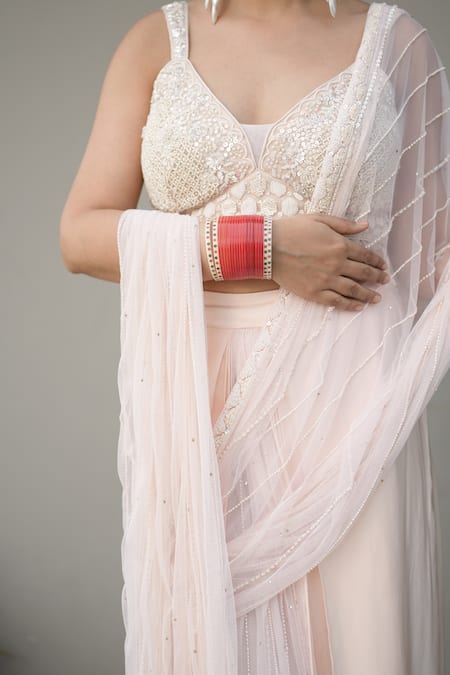 Shop_Rirasa_Peach Georgette Beads, Sequins, Aida Embellished Pre-draped Saree With Blouse _Online_at_Aza_Fashions
