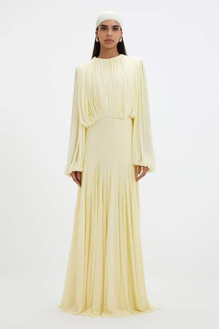 Deme By Gabriella_Yellow Lycra, Net Round Neck Jeanie Pleated Balloon Sleeve Gown _at_Aza_Fashions