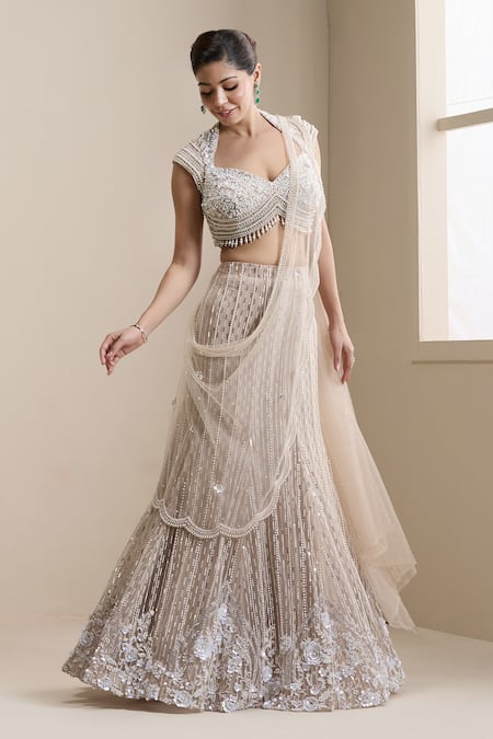 Shop_Chaashni By Maansi And Ketan_Beige Net Sequins, Pearls, Embellished Pre-draped Lehenga Saree With Blouse _Online_at_Aza_Fashions