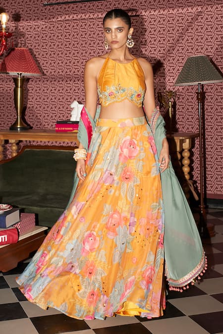 Rishi and Vibhuti Yellow Crepe Embroidery, Pom-poms Halter Neck Boho Bloom Print Skirt Set at Aza Fashions Rishi and Vibhuti_Yellow Crepe Embroidery, Pom-poms Halter Neck Boho Bloom Print Skirt Set _at_Aza_Fashions