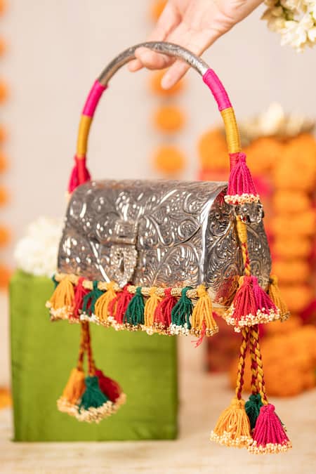5elements_Silver Tassels, Beads Anvika Embossed Metallic Handbag  _at_Aza_Fashions