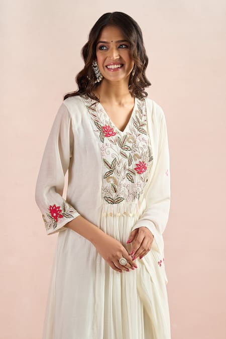 Shop Samyukta Singhania Ivory Embroidery, Tassels V-neck Floral Yoke Work Kurta Set Online at Aza Fashions Shop_Samyukta Singhania_Ivory Embroidery, Tassels V-neck Floral Yoke Work Kurta Set _Online_at_Aza_Fashions