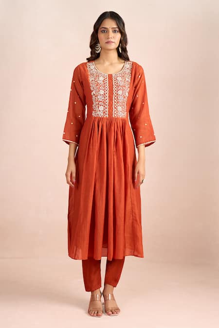 Samyukta Singhania_Orange Embroidery, Tassels Round Neck Floral Yoke Kurta Set _at_Aza_Fashions