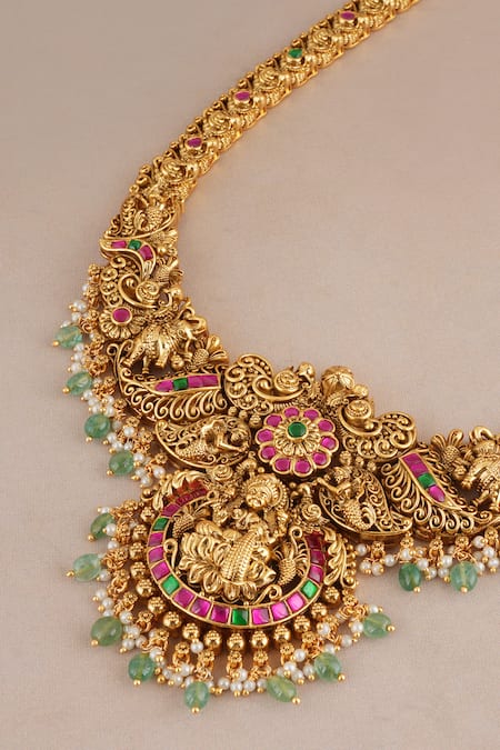 Smars Jewelry_Gold Plated Stones, Pearls Maa Lakshmi Carved Antique Temple Necklace Set _at_Aza_Fashions