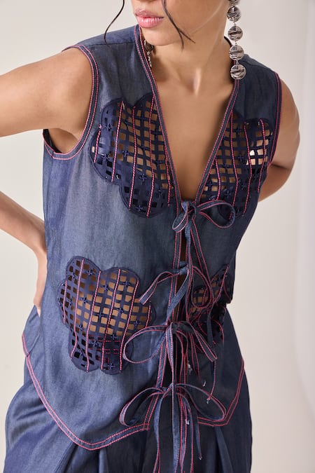 Needleten Blue Tencel, Denim Cut Work, Embroidery V-neck Cutwork Tie-up Blouse at Aza Fashions Needleten_Blue Tencel, Denim Cut Work, Embroidery V-neck Cutwork Tie-up Blouse _at_Aza_Fashions