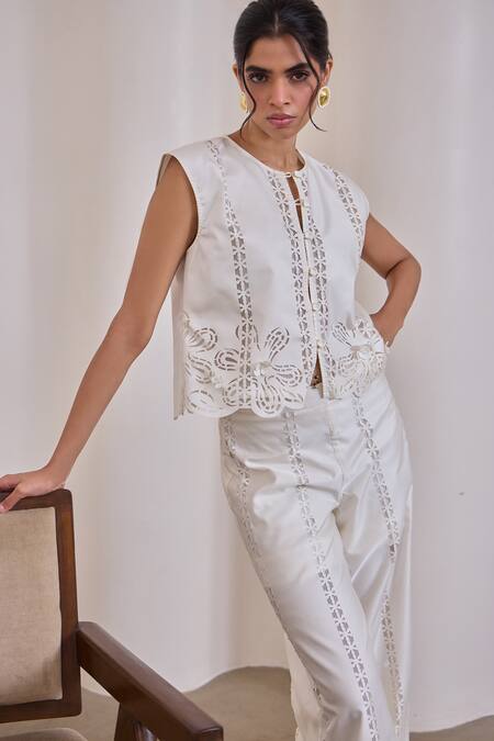 Needleten_Ivory Taffeta, Cotton Cut Work, Applique Laser Cutwork Button Closure Jacket _at_Aza_Fashions
