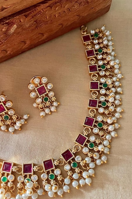 Saga Jewels_Multi Color Pearls, Stones, Faux Diamonds, Beads Embellished Temple Necklace Set _Online_at_Aza_Fashions