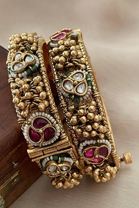 Saga Jewels_Gold Plated Beads, Stones, Pearls Ghunghroo Embellished Pair Of Temple Bangles _Online_at_Aza_Fashions