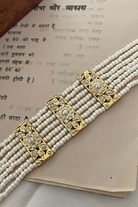 Shop Saga Jewels White Pearls, Stones Embellished Bracelet Online at Aza Fashions Shop_Saga Jewels_White Pearls, Stones Embellished Bracelet _Online_at_Aza_Fashions