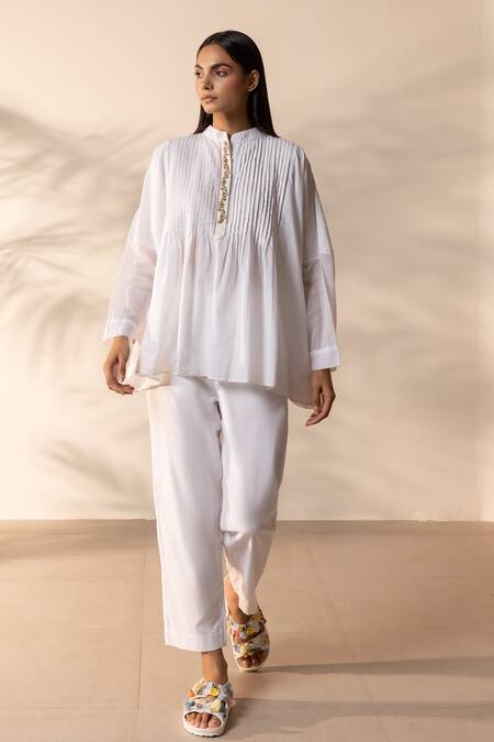 Buy OurDve White Cotton Embroidery Mandarin Collar Drizzle Pintucked Top Online at Aza Fashions Buy_OurDve_White Cotton Embroidery Mandarin Collar Drizzle Pintucked Top _Online_at_Aza_Fashions