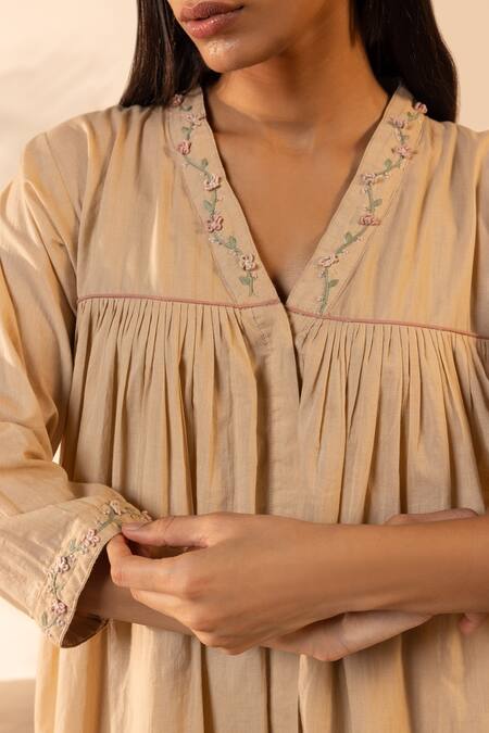 OurDve Beige Cotton Embroidery, Piping V-neck Floret Gathered Dress at Aza Fashions OurDve_Beige Cotton Embroidery, Piping V-neck Floret Gathered Dress _at_Aza_Fashions