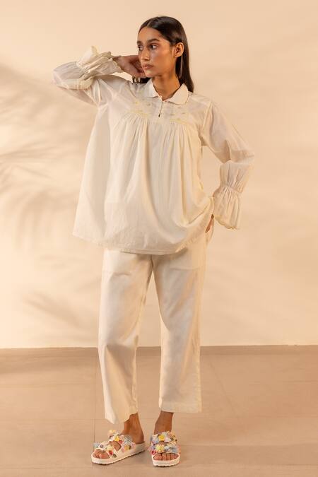 Buy OurDve Beige Cotton Embroidery Collared, Button-down Neck Zesty Smocked Top Online at Aza Fashions Buy_OurDve_Beige Cotton Embroidery Collared, Button-down Neck Zesty Smocked Top _Online_at_Aza_Fashions