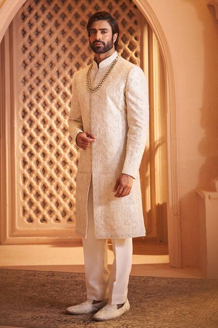 Buy_Millionaire_Cream Silk Zari, Pearls, Embroidery Floral Pattern Sherwani Set _Online_at_Aza_Fashions