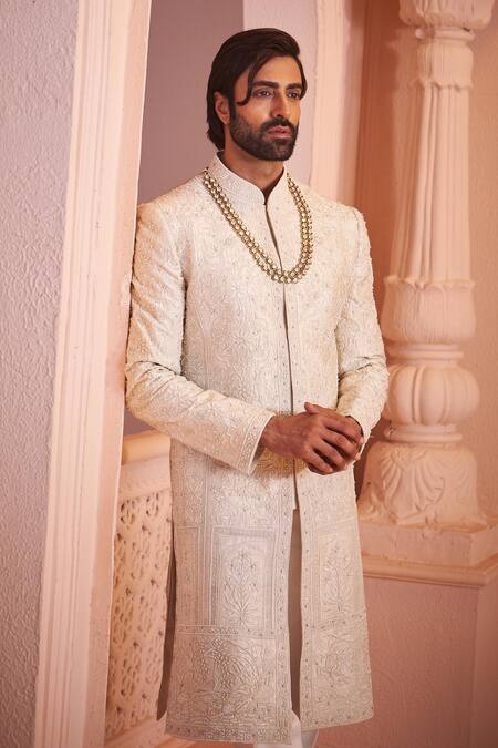 Millionaire_Cream Silk Zari, Pearls, Embroidery Floral Pattern Sherwani Set _at_Aza_Fashions