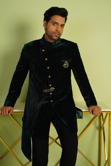 Millionaire_Green Velvet Brooches, Studs Shimmer Sherwani Set _at_Aza_Fashions