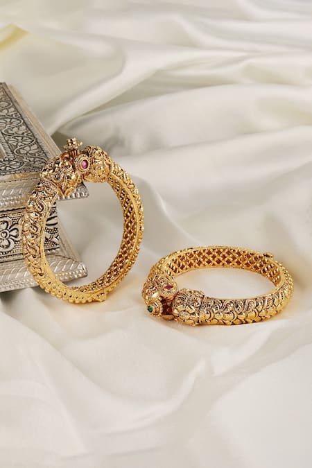 Prestones Gold Plated Stones Carved Head Nakshi Work Temple Kada Bangles Online at Aza Fashions Prestones_Gold Plated Stones Carved Head Nakshi Work Temple Kada Bangles _Online_at_Aza_Fashions