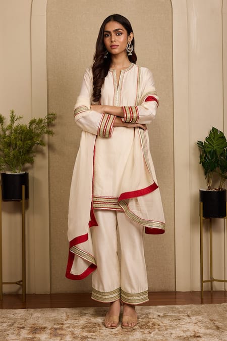 Neha Mehra_Ivory Chanderi Embroidery, Piping Split V-neck Hand Kurta Set _at_Aza_Fashions