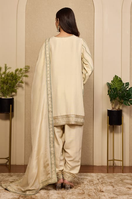 Neha Mehra_Beige Embroidery, Zari, Cut Work Round Neck, Button-down Hand Kurta Salwar Set _at_Aza_Fashions