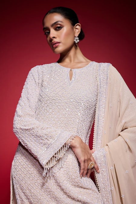 Neha Mehra_Beige Georgette Sequins, Beads, Piping Keyhole Neck Embroidered Kurta Pant Set _at_Aza_Fashions