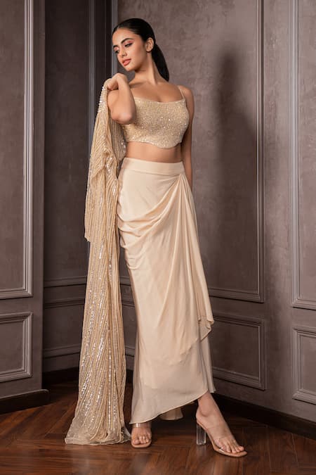 Buy_AMRIN KHAN_Gold Crepe, Silk Sequins, Beads Round Neck, And Cutdana Embroidered Cape Skirt Set _Online_at_Aza_Fashions