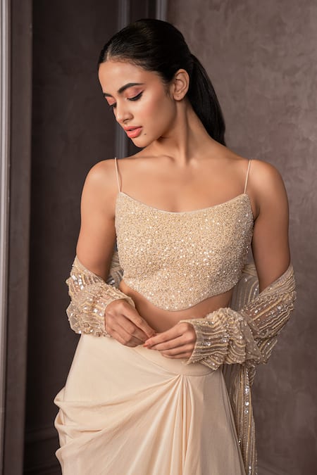 AMRIN KHAN_Gold Crepe, Silk Sequins, Beads Round Neck, And Cutdana Embroidered Cape Skirt Set _at_Aza_Fashions