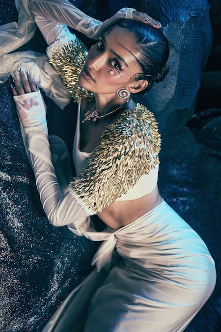 Nirmooha_Ivory Lycra Metallic Thread, Elaris Pre-draped Saree With Embroidered Blouse _at_Aza_Fashions