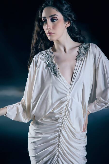 Nirmooha_Ivory Lycra Embroidery, Tassels V-neck Selene Aura Gown _Online_at_Aza_Fashions