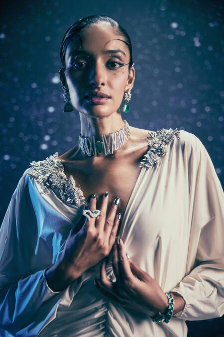 Shop_Nirmooha_Ivory Lycra Embroidery, Tassels V-neck Selene Aura Gown _Online_at_Aza_Fashions