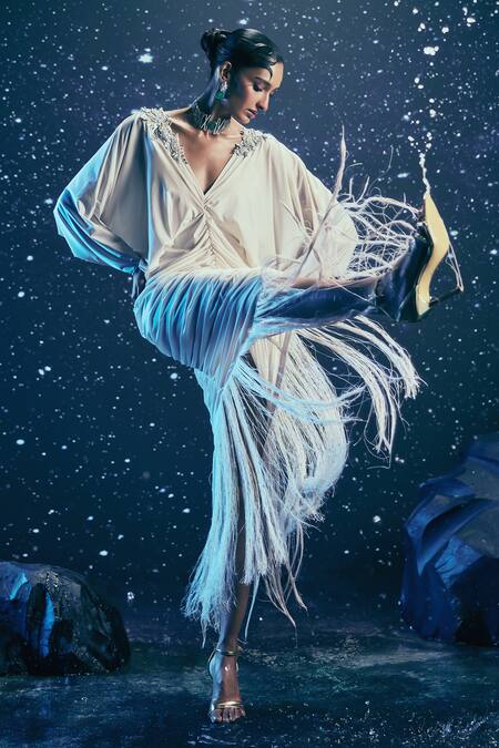 Nirmooha_Ivory Lycra Embroidery, Tassels V-neck Selene Aura Gown _at_Aza_Fashions