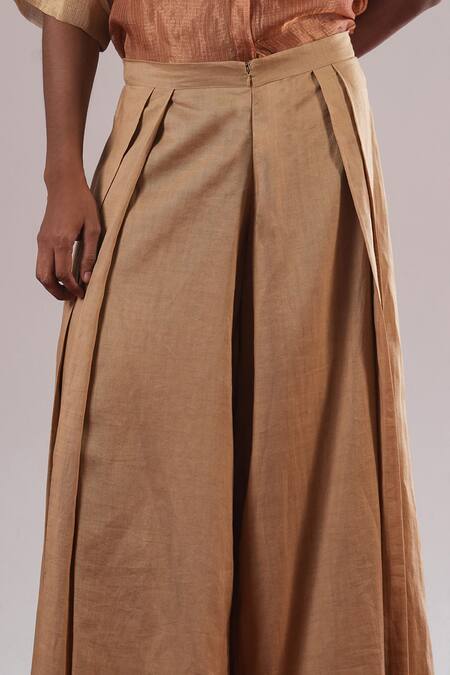 Urvashi Kaur_Beige Ramie, Linen Mascon Pleated Wide-legged Trousers _Online_at_Aza_Fashions