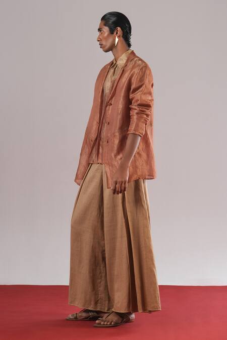 Urvashi Kaur_Beige Ramie, Linen Mascon Pleated Wide-legged Trousers _at_Aza_Fashions