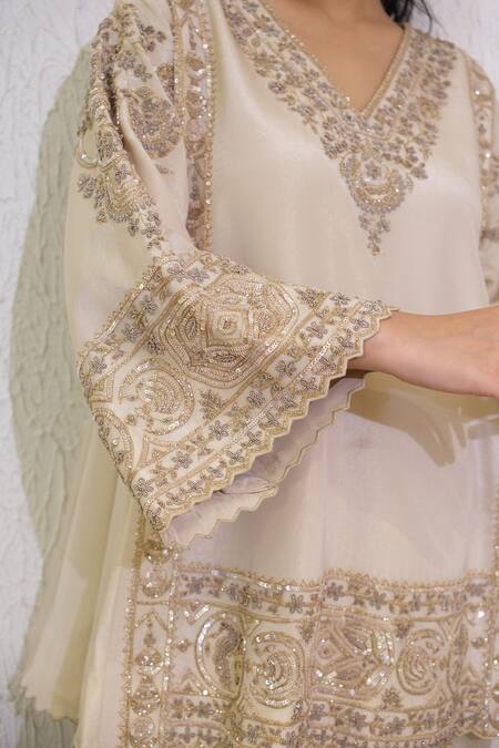 Shop Label Deepshika Agarwal Ivory Tissue Embroidery, Sequins V-neck Hand Kurta And Dhoti Pant Set Online at Aza Fashions Shop_Label Deepshika Agarwal_Ivory Tissue Embroidery, Sequins V-neck Hand Kurta And Dhoti Pant Set _Online_at_Aza_Fashions