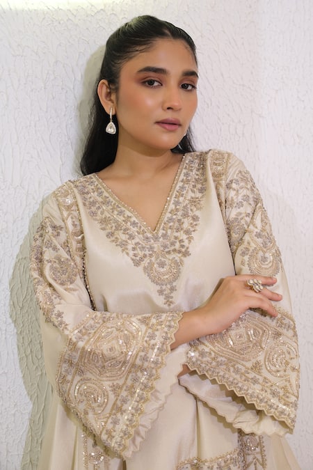 Label Deepshika Agarwal Ivory Tissue Embroidery, Sequins V-neck Hand Kurta And Dhoti Pant Set at Aza Fashions Label Deepshika Agarwal_Ivory Tissue Embroidery, Sequins V-neck Hand Kurta And Dhoti Pant Set _at_Aza_Fashions