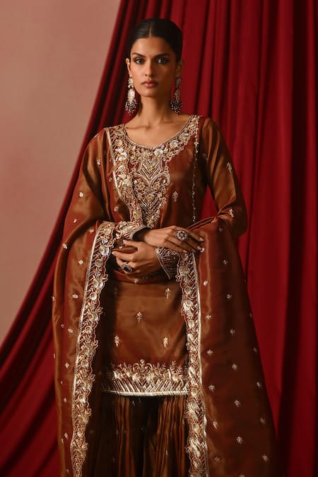 Shop_Lashkaraa_Brown Tissue Embroidery, Sequins, Zari Round Neck Floral Kurta Gharara Set _Online_at_Aza_Fashions
