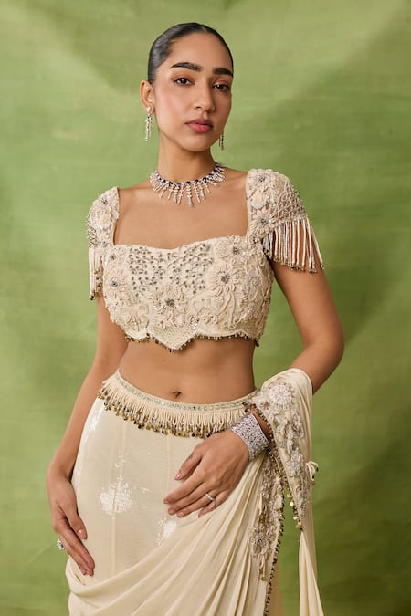 Buy_Awigna_Ivory Silk Sequins, Beads, Tassels Zahira Embroidered Blouse And Draped Saree Set _Online_at_Aza_Fashions