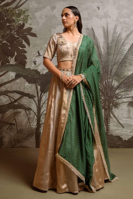 Parshya_Gold Silk, Chiffon Stones, Embroidery, Sequins, Fringe V-neck Hand Lehenga Set _at_Aza_Fashions