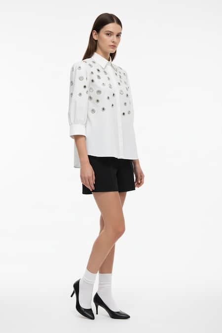 Studio Moda India White Cotton Collared Embellished Eyelet U-hem Shirt Online at Aza Fashions Studio Moda India_White Cotton Collared Embellished Eyelet U-hem Shirt _Online_at_Aza_Fashions