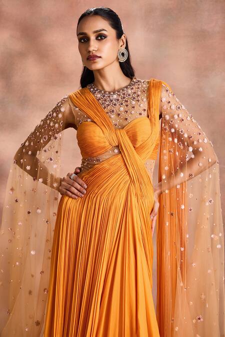 Supria Munjal_Yellow Silk, Chiffon, Net Sequins, Beads Choker Neck Fluid Draped Saree Gown _at_Aza_Fashions