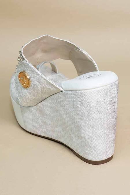 Sana K luxurious Footwear White Embroidery, Beads Kolhapuri Wedges at Aza Fashions Sana K luxurious Footwear_White Embroidery, Beads Kolhapuri Wedges _at_Aza_Fashions