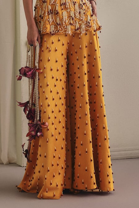 Payal & Zinal_Yellow Twill Beads, Pearls, Cut Work, Tassels Bandeau Frezzy Top And Palazzo Set _Online_at_Aza_Fashions