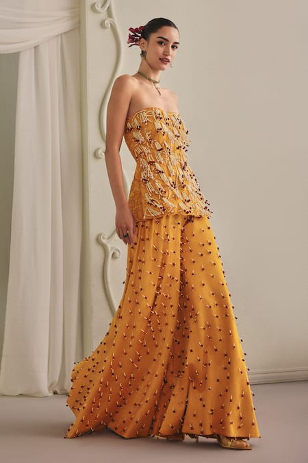 Buy_Payal & Zinal_Yellow Twill Beads, Pearls, Cut Work, Tassels Bandeau Frezzy Top And Palazzo Set _Online_at_Aza_Fashions