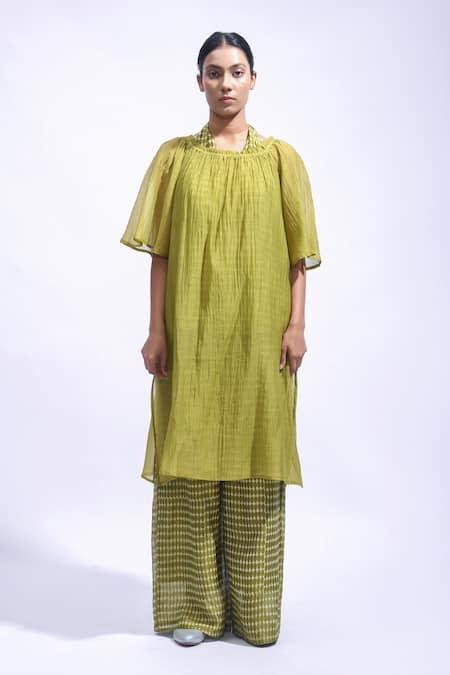 JAYATI GOENKA Olive Green Chanderi Silk Off-shoulder, Halter Neck Tunic And Pant Set at Aza Fashions JAYATI GOENKA_Olive Green Chanderi Silk Off-shoulder, Halter Neck Tunic And Pant Set _at_Aza_Fashions