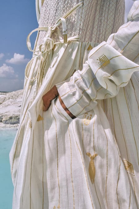 Shop Ahmev Gold Cotton, Chanderi Beads, Tassels V-neck Elysia Printed Angarkha Dress Online at Aza Fashions Shop_Ahmev_Gold Cotton, Chanderi Beads, Tassels V-neck Elysia Printed Angarkha Dress _Online_at_Aza_Fashions