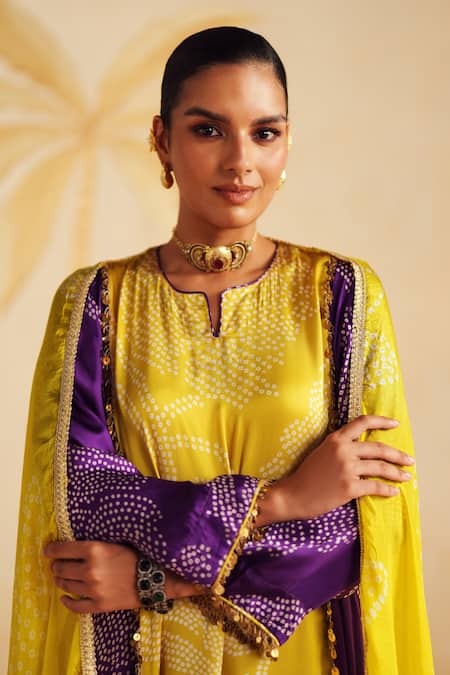 Rainas_Yellow Satin, Silk Tassels Split V-neck Bandhej Ruhani Printed Kurta Pant Set _at_Aza_Fashions