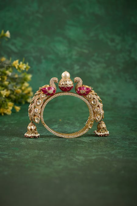 Buy_Kaari_Gold Plated Pearls, Stones, Crystals, Tassels Mayur Carved Kada _Online_at_Aza_Fashions